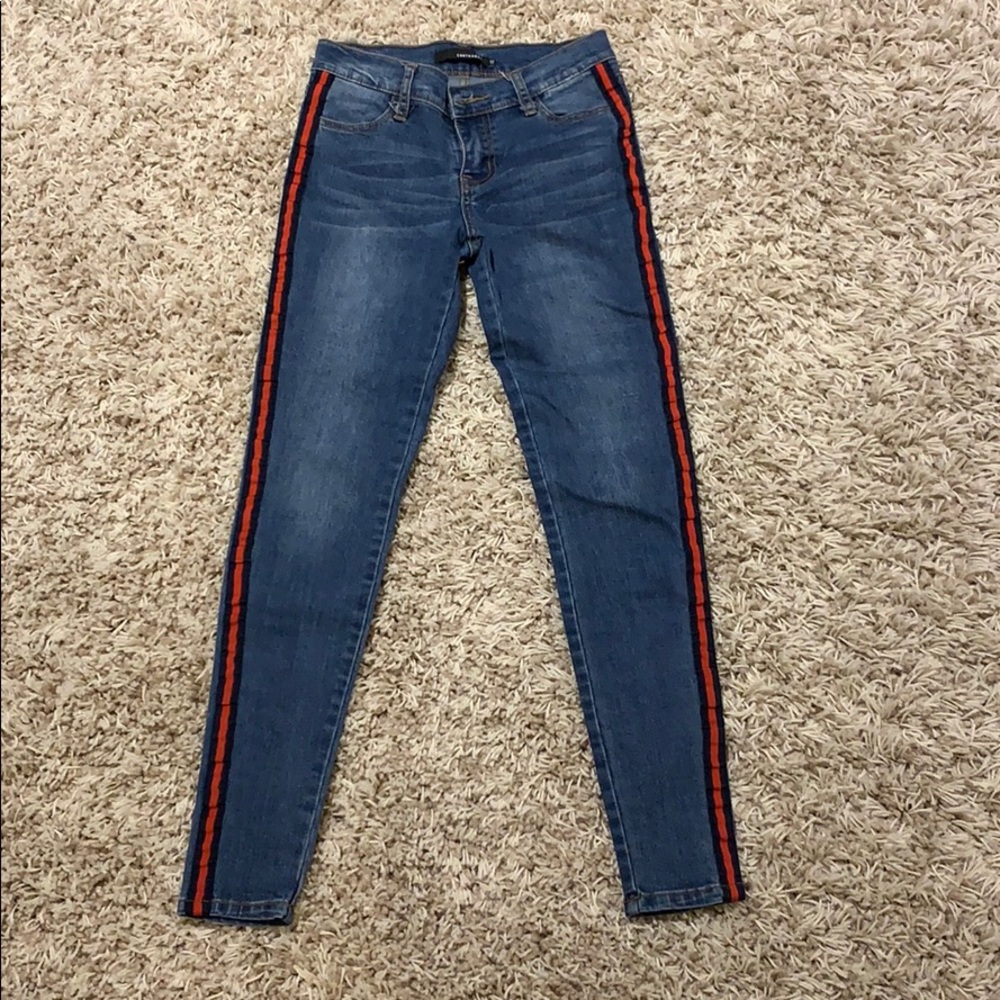 Blue jeans with red stripe